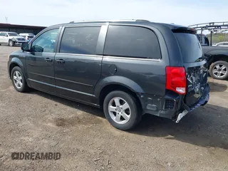 2011 Dodge Grand Caravan Crew with VIN 2D4RN5DG3BR660235, listed as a IAAI auction lot 41945522 with 148,924 mi miles and . Bid and sale history available at DreamBid. Image 3.