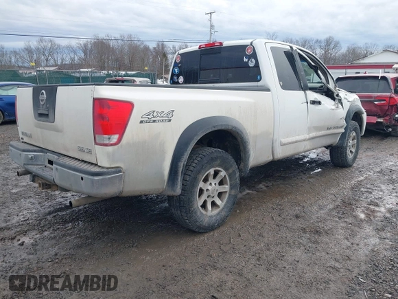 2005 Nissan Titan SE with VIN 1N6AA06BX5N512401, listed as a IAAI auction lot 41462412 with 247,849 mi miles and . Bid and sale history available at DreamBid. Image 4.