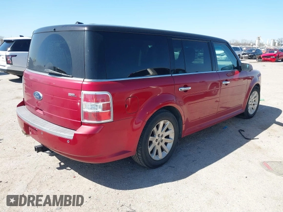 2009 Ford Flex SEL with VIN 2FMDK52C89BA77688, listed as a IAAI auction lot 41763979 with 196,989 mi miles. Bid and sale history available at carsss.com. Image 4.