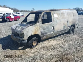 1998 Ford Econoline Cargo with VIN 1FTRE1423WHA86845, listed as a IAAI auction lot 41741274 with Not Provided miles. Bid and sale history available at carsss.com. Image 2.