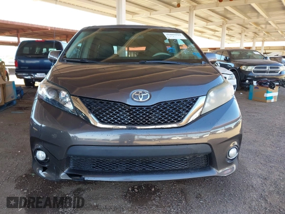 2011 Toyota Sienna SE with VIN 5TDXK3DC6BS113711, listed as a IAAI auction lot 41809910 with 174,746 mi miles. Bid and sale history available at carsss.com. Image 12.