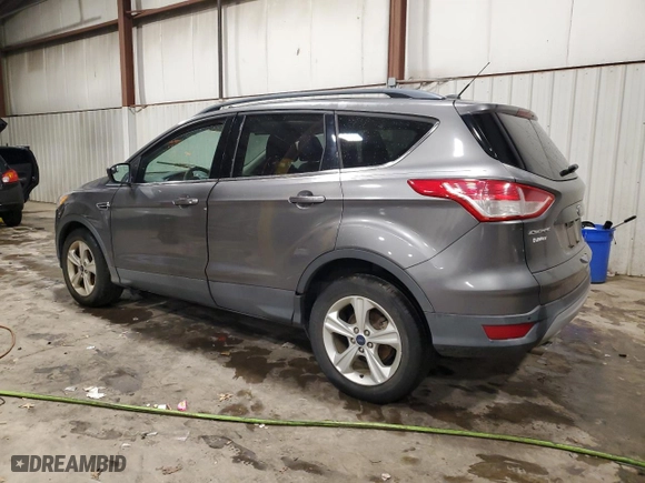 2014 Ford Escape SE with VIN 1FMCU9GX0EUC04253, listed as a Copart auction lot 83739424 with 0 mi miles and Salvage Title. Bid and sale history available at carsss.com. Image 2.