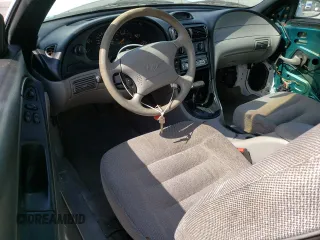 1996 Ford Mustang with VIN 1FALP4041TF206244, listed as a Copart auction lot 56311934 with 123,572 mi miles and Salvage Title. Bid and sale history available at carsss.com. Image 8.