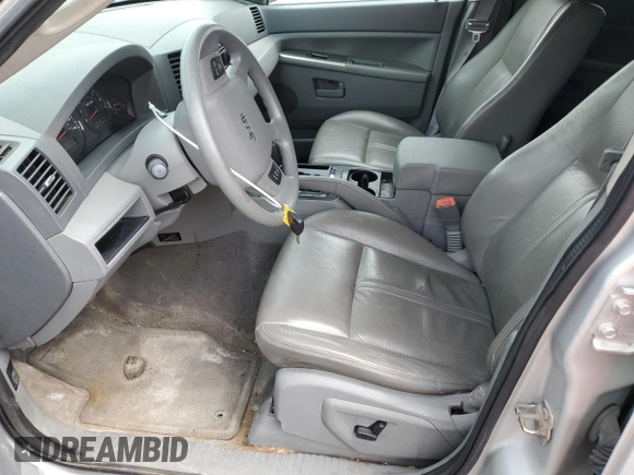 2005 Jeep Grand Cherokee Laredo with VIN 1J4GR48KX5C565762, listed as a Copart auction lot 63080115 with 122,349 mi miles and Salvage title. Bid and sale history available at DreamBid. Image 7.