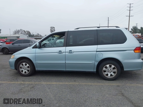 2003 Honda Odyssey EX-L with VIN 5FNRL18943B138444, listed as a IAAI auction lot 41498605 with 153,947 mi miles and . Bid and sale history available at DreamBid. Image 15.