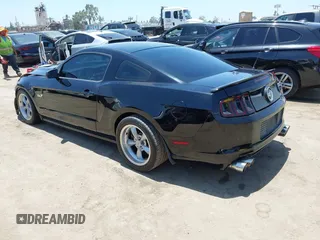 2013 Ford Mustang GT with VIN 1ZVBP8CF1D5232518, listed as a IAAI auction lot 42532816 with 170,412 mi miles and . Bid and sale history available at DreamBid. Image 3.