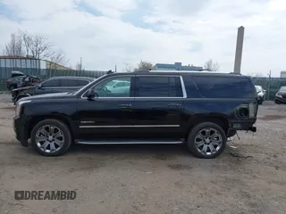2016 GMC Yukon XL Denali with VIN 1GKS2HKJ8GR139858, listed as a IAAI auction lot 41915183 with 151,830 mi miles. Bid and sale history available at carsss.com. Image 15.
