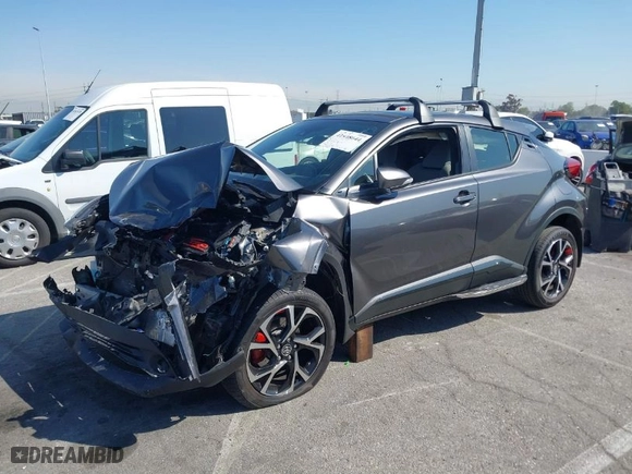 2019 Toyota C-HR XLE with VIN JTNKHMBX4K1026497, listed as a IAAI auction lot 41848644 with 53,211 mi miles. Bid and sale history available at carsss.com. Image 14.