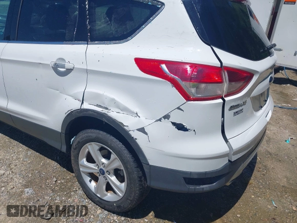 2014 Ford Escape SE with VIN 1FMCU9G90EUB76911, listed as a IAAI auction lot 42143518 with 123,466 mi miles and . Bid and sale history available at DreamBid. Image 6.