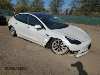 2021 Tesla Model 3 Standard Range Plus z VIN 5YJ3E1EAXMF870285, wystawiony jako Copart lot #53251375 z przebiegiem 64 085 mil mil oraz Szkody całkowita. Historia ofert i sprzedaży dostępna na DreamBid. Obrazek 4.