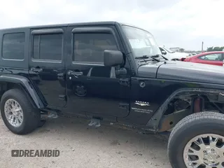 2008 Jeep Wrangler Unlimited Sahara с VIN 1J4GA59188L624010, выставлен на аукционе IAAI как лот 42115574 с пробегом 105 800 миль миль и . История ставок и продаж доступна на DreamBid. Изображение 13.