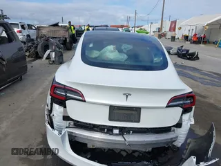 2021 Tesla Model 3 Standard Range Plus z VIN 5YJ3E1EA5MF941392, wystawiony jako IAAI lot #41888597 z przebiegiem 111 617 mil mil oraz . Historia ofert i sprzedaży dostępna na DreamBid. Obrazek 15.
