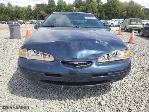 1996 Ford Thunderbird LX with VIN 1FALP62WXTH177910, listed as a Copart auction lot 70954694 with NaN miles and Salvage Title. Bid and sale history available at carsss.com. Image 5.