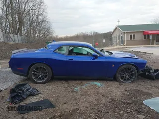 2021 Dodge Challenger R/T Scat Pack Widebody z VIN 2C3CDZFJXMH615361, wystawiony jako IAAI lot #41911374 z przebiegiem 27 159 mil mil oraz . Historia ofert i sprzedaży dostępna na DreamBid. Obrazek 14.