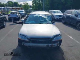 1998 Honda Accord LX z VIN 1HGCG5642WA268665, wystawiony jako IAAI lot #42183420 z przebiegiem 254 417 mil mil oraz . Historia ofert i sprzedaży dostępna na DreamBid. Obrazek 11.