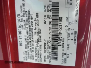 2015 Ford Mustang EcoBoost z VIN 1FA6P8TH4F5317108, wystawiony jako Copart lot #56653335 z przebiegiem 99 321 mil mil oraz Czysty tytuł • Clean title. Historia ofert i sprzedaży dostępna na DreamBid. Obrazek 12.