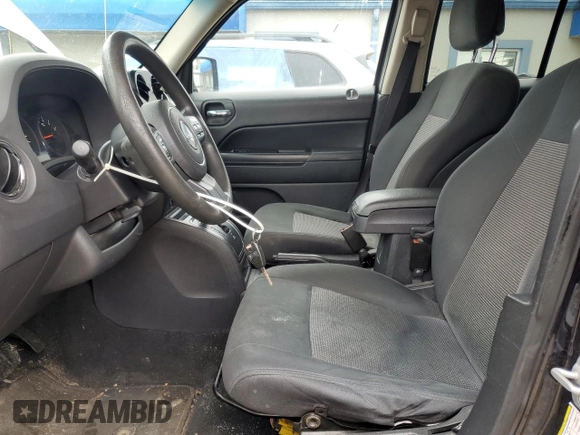 2011 Jeep Patriot Sport with VIN 1J4NF1GB4BD140947, listed as a Copart auction lot 52035655 with 183,024 mi miles and Salvage Title. Bid and sale history available at DreamBid. Image 7.