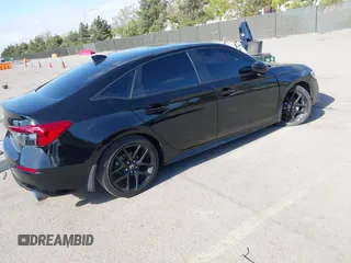2023 Honda Civic Sport with VIN 2HGFE2F55PH505548, listed as a IAAI auction lot 42128060 with 46,350 mi miles and . Bid and sale history available at DreamBid. Image 4.