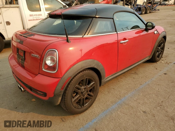 2012 MINI Coupe S z VIN WMWSX3C57CT155013, wystawiony jako Copart lot #88066275 z przebiegiem 69 870 mil mil oraz Szkody całkowita. Historia ofert i sprzedaży dostępna na DreamBid. Obrazek 3.