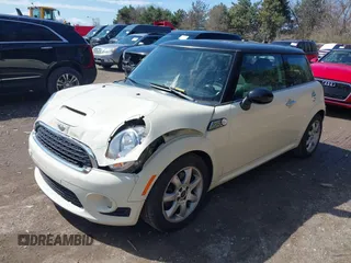 2010 MINI Hardtop S with VIN WMWMF7C55ATZ71881, listed as a IAAI auction lot 41893555 with 77,953 mi miles and . Bid and sale history available at DreamBid. Image 2.