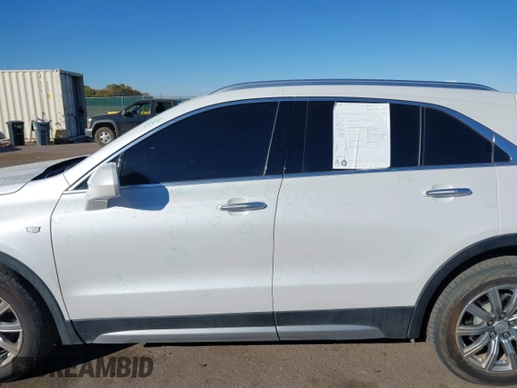 2020 Cadillac XT4 AWD Premium Luxury z VIN 1GYFZDR46LF083118, wystawiony jako IAAI lot #40495567 z przebiegiem 83 224 mil mil oraz . Historia ofert i sprzedaży dostępna na DreamBid. Obrazek 14.