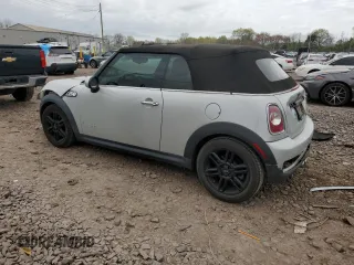 2015 MINI Convertible S with VIN WMWZP3C57F2A91437, listed as a Copart auction lot 53883525 with 28,185 mi miles and Salvage title. Bid and sale history available at DreamBid. Image 2.