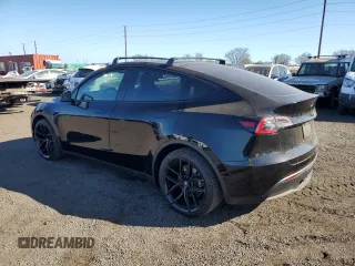 2022 Tesla Model Y Long Range z VIN 7SAYGDEE2NF391349, wystawiony jako Copart lot #85351924 z przebiegiem 5 670 mil mil oraz Szkoda całkowita • Salvage title. Historia ofert i sprzedaży dostępna na DreamBid. Obrazek 2.