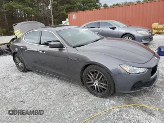 2014 Maserati Ghibli z VIN ZAM57XSA9E1096594, wystawiony jako Copart lot #47187285 z przebiegiem 114 050 mil mil oraz Szkody całkowita. Historia ofert i sprzedaży dostępna na DreamBid. Obrazek 4.