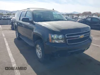 2013 Chevrolet Suburban LS with VIN 1GNSKHE71DR332335, listed as a IAAI auction lot 41408949 with 167,860 mi miles. Bid and sale history available at carsss.com. Image 1.