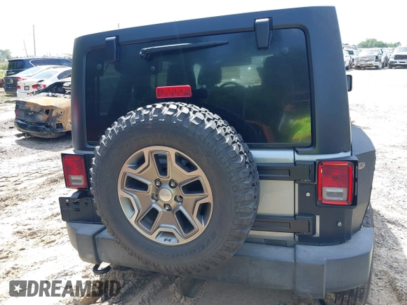 2016 Jeep Wrangler Unlimited Rubicon Hard Rock with VIN 1C4BJWFG6GL265320, listed as a IAAI auction lot 42260151 with Not provided miles and . Bid and sale history available at DreamBid. Image 15.