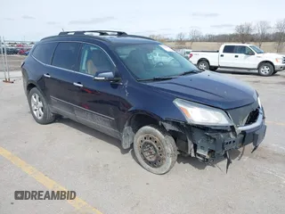 2016 Chevrolet Traverse LTZ z VIN 1GNKRJKD3GJ239591, wystawiony jako IAAI lot #41948459 z przebiegiem 96 696 mil mil oraz . Historia ofert i sprzedaży dostępna na DreamBid. Obrazek 1.