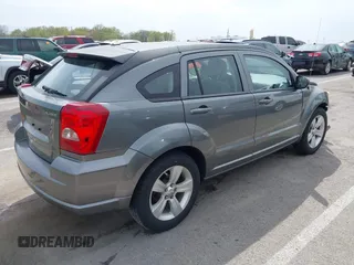 2012 Dodge Caliber SXT with VIN 1C3CDWDA6CD506019, listed as a IAAI auction lot 41999560 with 146,446 mi miles and . Bid and sale history available at DreamBid. Image 4.