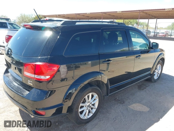 2015 Dodge Journey SXT with VIN 3C4PDCBG3FT678686, listed as a IAAI auction lot 42101541 with 185,514 mi miles and . Bid and sale history available at DreamBid. Image 4.