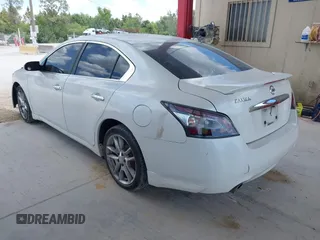2013 Nissan Maxima SV with VIN 1N4AA5AP8DC814580, listed as a IAAI auction lot 42179159 with 122,758 mi miles and . Bid and sale history available at DreamBid. Image 3.