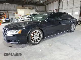 2015 Audi A8 3.0T с VIN WAU3GAFD2FN040940, выставлен на аукционе Copart как лот 65327685 с пробегом 113 443 миль миль и Чистый • Clean title. История ставок и продаж доступна на DreamBid. Изображение 1.