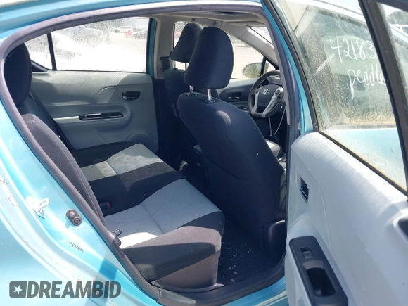 2014 Toyota Prius One with VIN JTDKDTB30E1077183, listed as a IAAI auction lot 42183675 with 92,560 mi miles and . Bid and sale history available at DreamBid. Image 8.