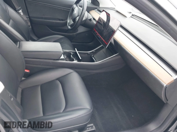2018 Tesla Model 3 Long Range Battery with VIN 5YJ3E1EA2JF071855, listed as a IAAI auction lot 41314974 with 169,318 mi miles and . Bid and sale history available at DreamBid. Image 5.