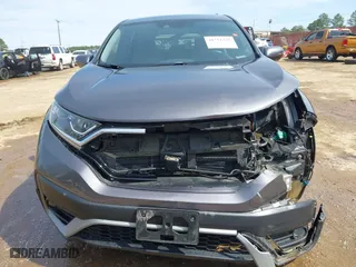 2021 Honda CR-V EX with VIN 2HKRW1H59MH404256, listed as a IAAI auction lot 41711235 with 100,389 mi miles. Bid and sale history available at carsss.com. Image 6.