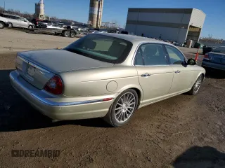2006 Jaguar XJ with VIN SAJWA79B56SH01865, listed as a Copart auction lot 42511925 with 262,968 mi miles and Salvage Title. Bid and sale history available at carsss.com. Image 3.