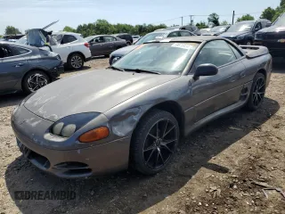 1995 Mitsubishi 3000GT z VIN JA3AV65J4SY817050, wystawiony jako Copart lot #59876934 z przebiegiem 118 454 mil mil oraz Tytuł czysty. Historia ofert i sprzedaży dostępna na DreamBid. Obrazek 1.