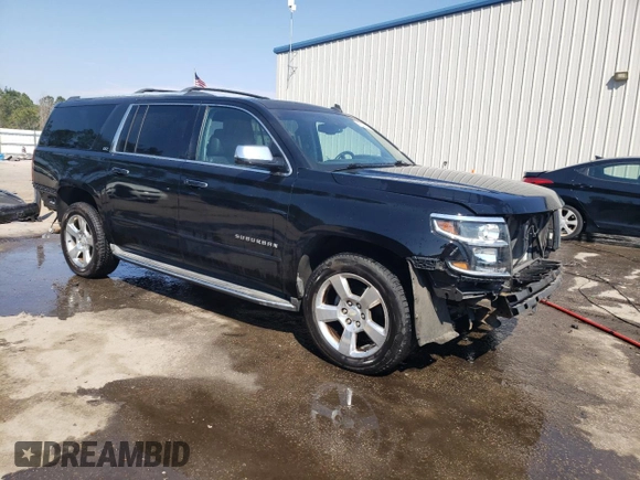 2015 Chevrolet Suburban LTZ with VIN 1GNSKKKC2FR210780, listed as a Copart auction lot 47207445 with 163,448 mi miles and Salvage Title. Bid and sale history available at carsss.com. Image 4.