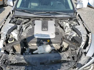 2015 Infiniti Q50 Premium with VIN JN1BV7AP7FM356447, listed as a Copart auction lot 58823045 with 137,642 mi miles and Salvage title. Bid and sale history available at DreamBid. Image 11.