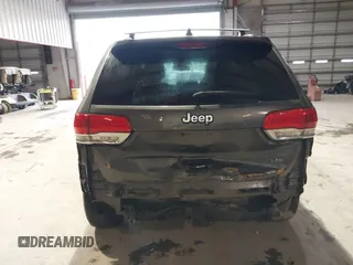2014 Jeep Grand Cherokee Laredo with VIN 1C4RJEAG7EC145023, listed as a IAAI auction lot 40518825 with 115,098 mi miles and . Bid and sale history available at DreamBid. Image 16.