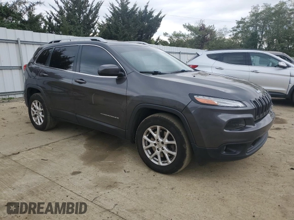 2014 Jeep Cherokee Altitude with VIN 1C4PJMCSXEW206494, listed as a Copart auction lot 74877164 with 183,549 mi miles and Salvage Title. Bid and sale history available at carsss.com. Image 4.