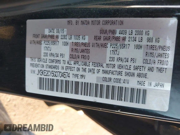 2016 Mazda CX-5 Touring with VIN JM3KE2CY5G0704574, listed as a IAAI auction lot 41033546 with 133,502 mi miles. Bid and sale history available at carsss.com. Image 9.