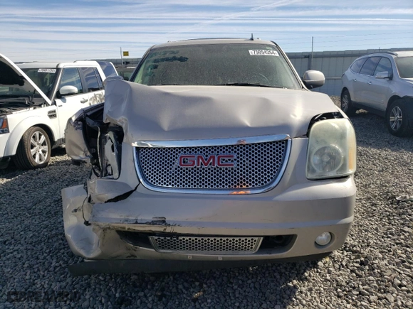 2007 GMC Yukon Denali with VIN 1GKFK63847J138982, listed as a Copart auction lot 75054264 with 194,713 mi miles and Salvage Title. Bid and sale history available at carsss.com. Image 5.