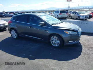2017 Ford Focus Titanium with VIN 1FADP3N25HL299817, listed as a IAAI auction lot 42161440 with 154,974 mi miles and . Bid and sale history available at carsss.com. Image 1.