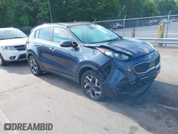 2021 Kia Sportage EX z VIN KNDPNCAC4M7897590, wystawiony jako IAAI lot #42183678 z przebiegiem 110 657 mil mil oraz . Historia ofert i sprzedaży dostępna na DreamBid. Obrazek 1.