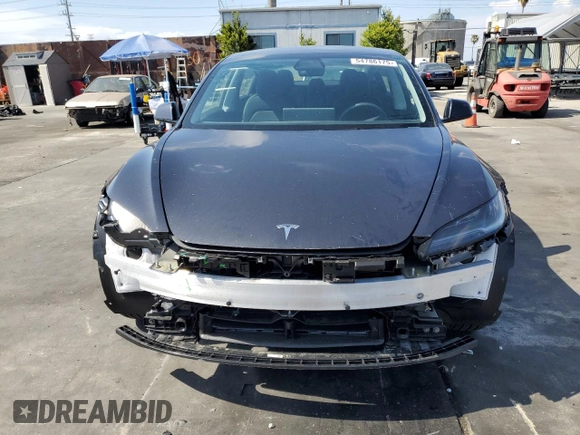 2025 Tesla Model 3 Long Range with VIN 5YJ3E1EA6SF908074, listed as a Copart auction lot 54786175 with 3,998 mi miles and Salvage title. Bid and sale history available at DreamBid. Image 5.