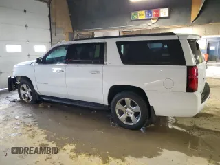 2020 Chevrolet Suburban LT with VIN 1GNSKHKC2LR187449, listed as a Copart auction lot 45943195 with 100,559 mi miles and Salvage Title. Bid and sale history available at carsss.com. Image 2.